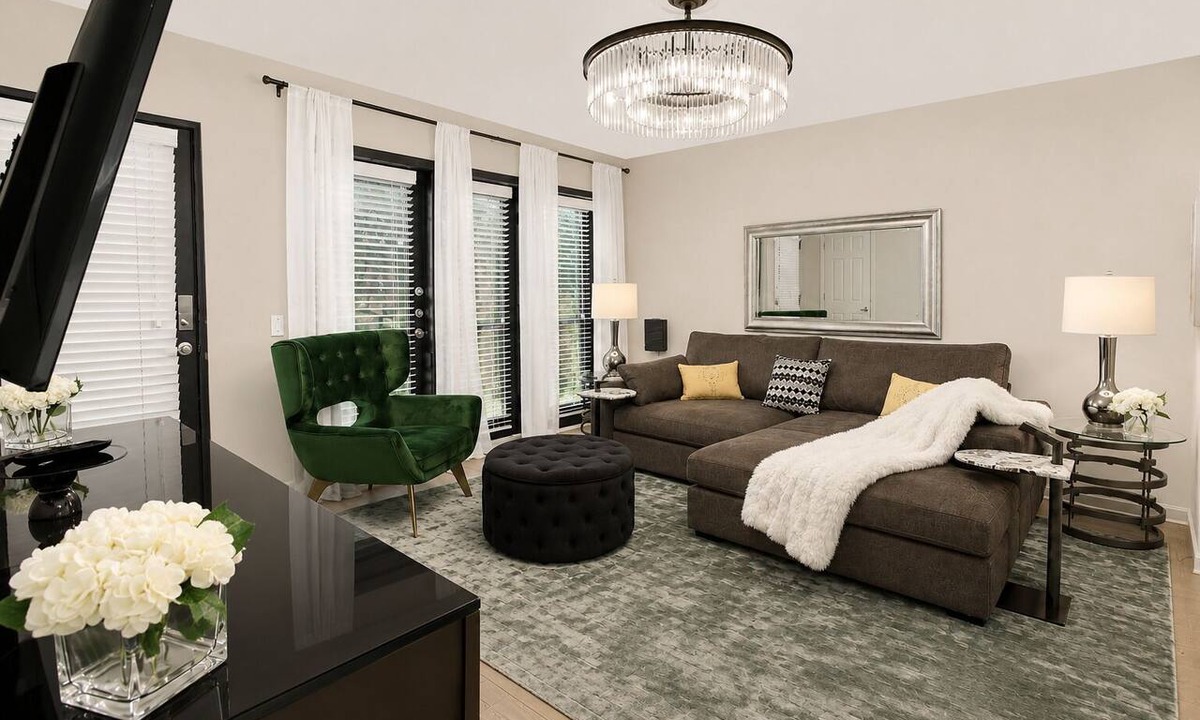 Old East Dallas Condo | 2BR/1.5BA furnished condo in Central Dallas with private patio and garden views. King + queen beds, modern kitchen, fast Wi-Fi, washer/dryer, gated parking. Resort courtyard with pool, sauna, cold plunge. Near Downtown.