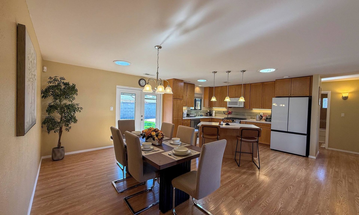 Northeast Heights House | Cozy open concept living with backyard.