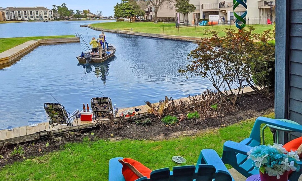 Walden on Lake Conroe Condo | ​🚤 FIRST-FLOOR GEM: Steps to Your Boat, Private Patio Fishing & Waterfall Views