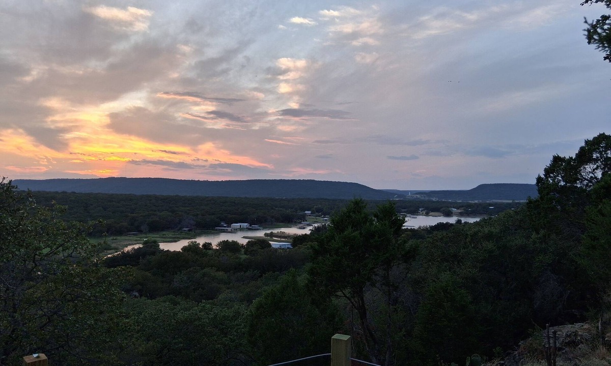 Gordon House | Secluded RV on mountain bluff on lake Palo Pinto, large deck. Bike,boat andswim.