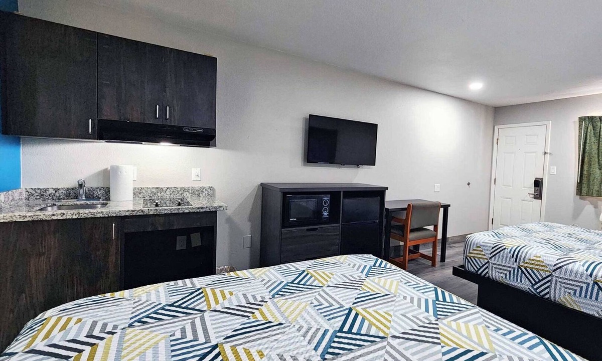 Wharton Hotel | Two Queen Beds Kitchenette Non-Smoking Room at Scottish Inns and Suites!