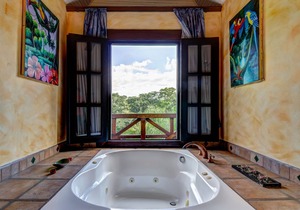 Riverfront Retreat with Balcony, WiFi, Partial AC, Shared Pool in San Ignacio