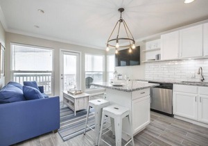 Trendy Beach Condo- Sunset views, Sandy Toes, Surfing more. (1304)