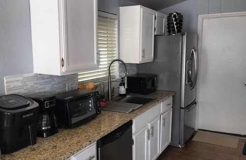 Biggs Field House | 3-bedroom home with AC refrigeration unit, WiFi, garage plus carport.