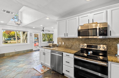 Leisure Land House | 6BR/5Bath Single Story Lake Front Home at Cedar Creek with 3 ensuites & huge patio