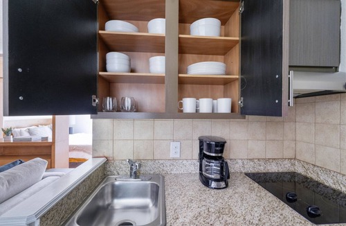 Gateway Apartment | Airy Gateway Studio w/Gym, Pool, nr Soccer, by Blueground