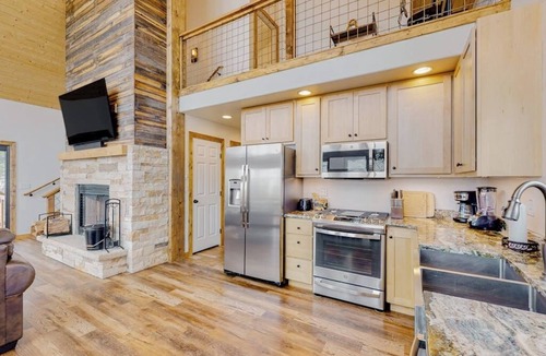 Bayfield House | Amazing lake view home with fireplace, W/D, kitchen, grill, balcony, and deck