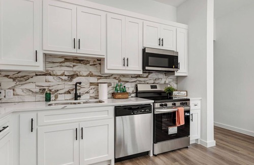Commerce House | Bright and cozy new build - your retreat awaits.