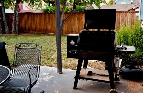 Over Place Area House | Centrally Located Spacious 3BR Storybook Cottage on Sayles Blvd