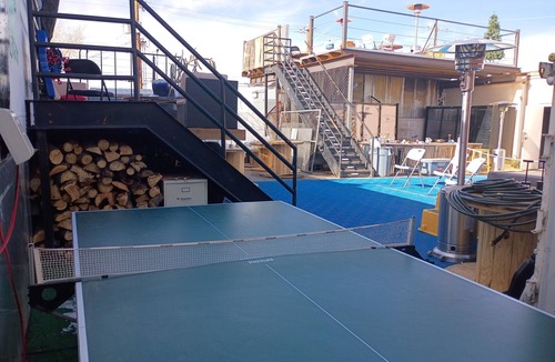 Trumbull Village Apartment | Creative Industrial Retreat with Decks, Games, Hot Tub & Spray Paint Trailer