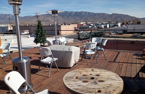 Trumbull Village Apartment | Creative Industrial Retreat with Decks, Games, Hot Tub & Spray Paint Trailer
