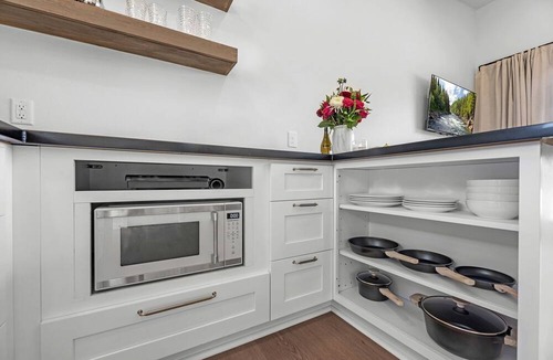 Waller Cabin | Elegant Tiny Home Resort with Heated Pool & Goats near Houston, Hempstead Texas