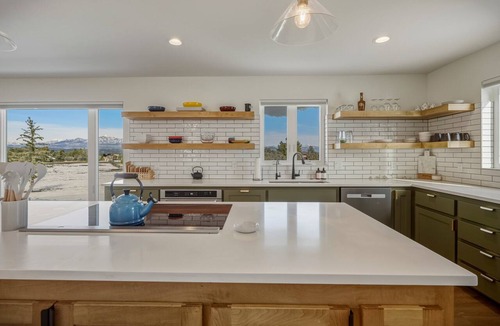Timber Ridge Ranch House | Expansive home that sleeps up to 7 on 5 acres with stunning mountain views, chef's kitchen, hot tub, entertainment room, 2 car garage, and 2 Fireplaces.