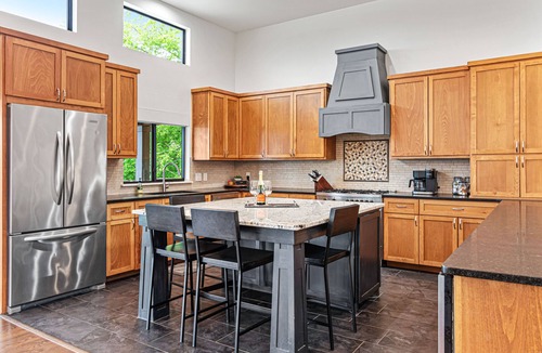 Volente Villa | Family & dog friendly luxury waterfront home with pool, hot-tub and boat dock