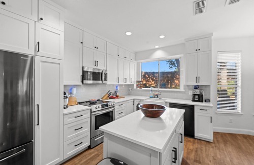 Hurst House | Family Friendly Hurst Home with Salwater Poo,l Fireplace, and Spacious Layout