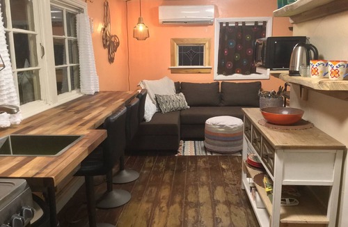 New Braunfels Cottage | Feel local! A Football Field Stroll to Downtown & the River! Pets encouraged!