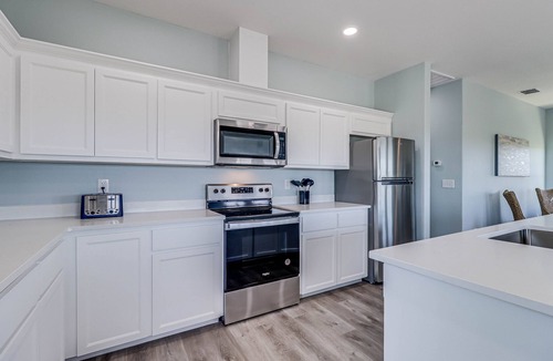 Aransas Pass House | Gorgeous side-by-side beach houses with furnished decks, AC, & full kitchens