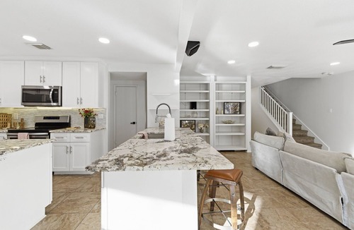 Wetmore House | Heated Pool, Hot Tub & Huge Backyard. Spacious Family Getaway 20 Minutes from DT
