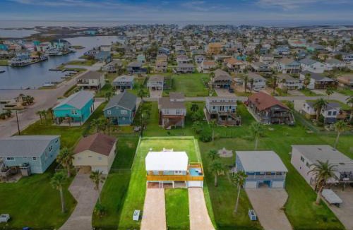Jamaica Beach House | Home with fire pit, large deck, game room and close to the beach