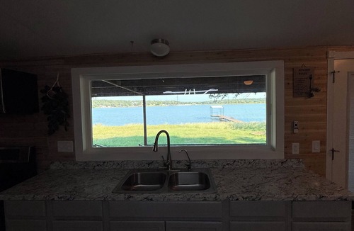 Nocona House | Lakefront 3BR/2BATH with Private Dock on 3/4 Acre in terrific Nocona with AC
