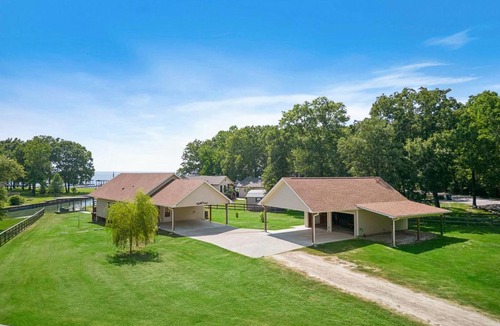 West Livingston House | Lakefront home with huge yard and picturesque front Porch