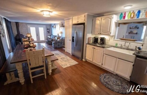 Granbury House | Lakeside Landing is on the water with beautiful views and a large deck.