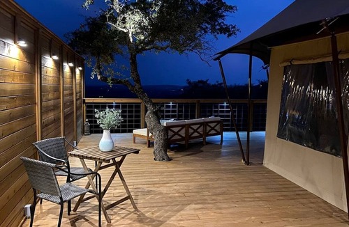 Oatmeal RV Rental | Luxury Hilltop Safari Tent with Private Hot Tub near Lake Travis in Marble Falls, Texas