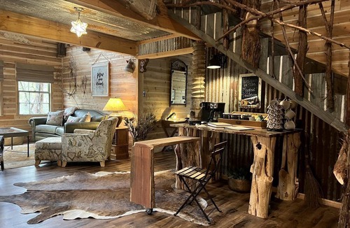 Dennis House | Magical Treehouse with Slide by Brazos River for Family Glamping Adventures in Texas