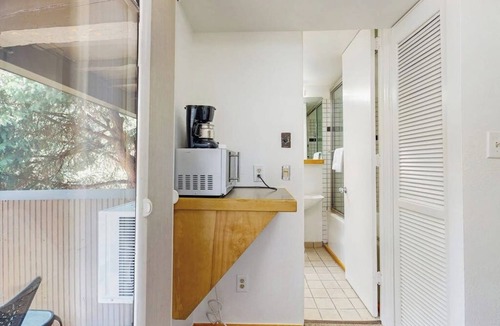 West End Apartment | Main Street room - hot tub & pool - walk to lifts, dog-friendly, balcony