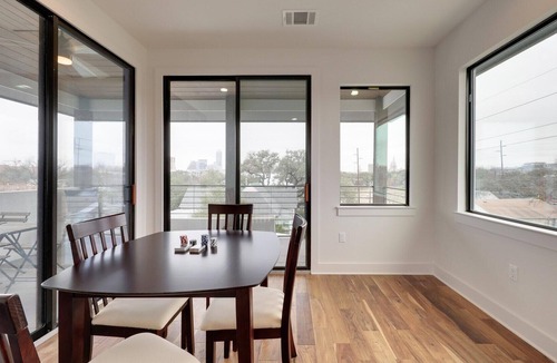 Swede Hill House | Minutes to Rainey St + Downtown, Downtown Views - Stylish Three Story Home - GuestSpaces