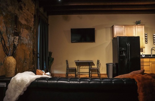 Sulphur Springs Apartment | Nestled in the buzzing heart of Sulphur Springs, White Oak Hotel isn't just a place to stay-it's an invitation to immerse yourself in a vibrant tapestry of creativity, flavor, and untamed beauty. Our intimate three-room retreat, born from historic bo
