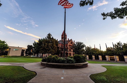 Sulphur Springs Apartment | Nestled in the buzzing heart of Sulphur Springs, White Oak Hotel isn't just a place to stay-it's an invitation to immerse yourself in a vibrant tapestry of creativity, flavor, and untamed beauty. Our intimate three-room retreat, born from historic bo