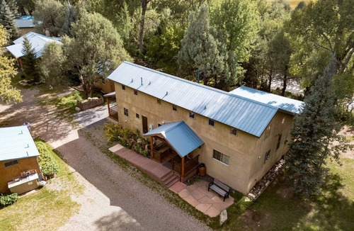 Pecos Cabin | New Mexico Glamping Paradise: Riverfront Rental for the Ultimate Retreat