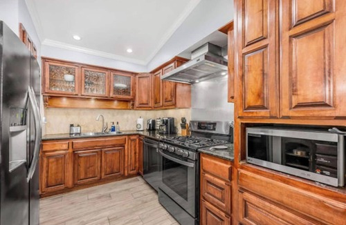 Northwest Dallas House | NEW! Texas Boudoir Estate Spa Home, a luxurious private getaway with indoor pool, sauna, steam‑room, hot tub, Jacuzzi, two king primary suites + loft queen ensuite, lush garden & pond, all in a quiet, upscale Dallas neighborhood.