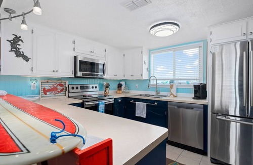 City-by-the Sea House | Off the Charts | Canal Front + Boat Dock