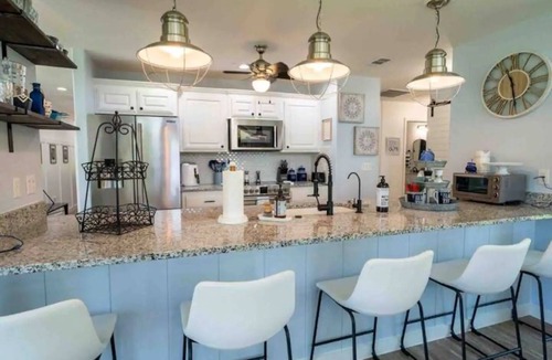 Log Cabin House | Pelican Estates Lake house at Cedar Creek Lake on wide cove in gated community.
