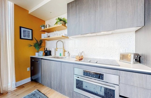 Rainey Street Historic District Condo | Rainey Street condo w/city-view balcony, rooftop pool & gym - Dogs OK