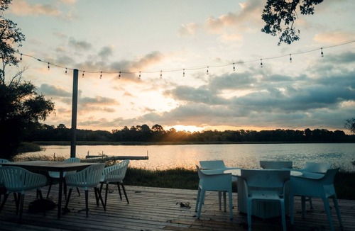 Bastrop RV Rental | Romantic Lakefront Safari Tent with Fire Pit and Peaceful Views near Bastrop, Texas