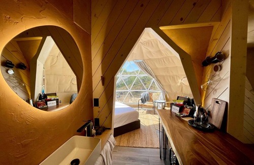 Oatmeal Cabin | Romantic Retreat: Luxury Glamping Dome with Hot Tub in Marble Falls, TX