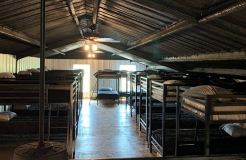 Burkett Cabin | Rustic Texas Ranch Lodge Sleeps 45~Private Lake~Exotic Wildlife~Group Getaways