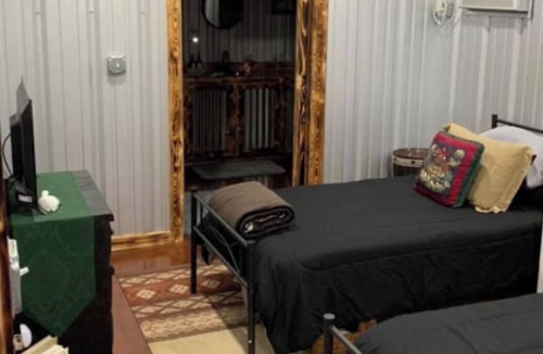 Burkett Cabin | Rustic Texas Ranch Lodge Sleeps 45~Private Lake~Exotic Wildlife~Group Getaways