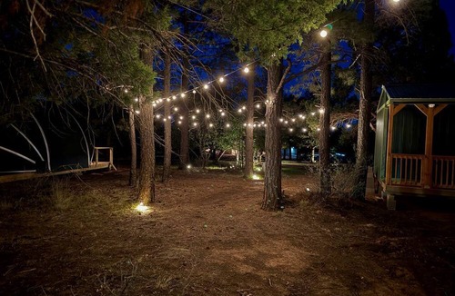McIntosh RV Rental | Scenic Mountain Glamping Tent with Orchard & Farm Animals near Quarai Ruins in Torreon, New Mexico