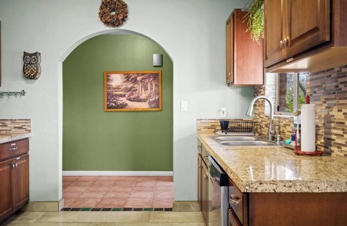 Tucson House | Serene 3BR retreat with Catalina Mountain views, shaded gazebo, BBQ grill & dog-friendly backyard.