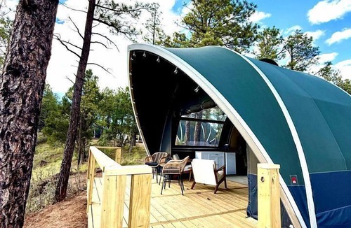 McIntosh RV Rental | Serene Glamping Retreat with Apple Orchards and Farm Animals near Quarai Ruins in Torreon, New Mexico