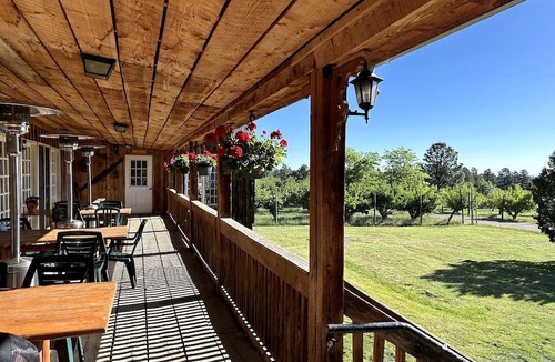 McIntosh RV Rental | Serene Glamping Retreat with Apple Orchards and Farm Animals near Quarai Ruins in Torreon, New Mexico