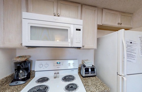 South Padre Island Condo | Spacious oasis near the beach with balcony, pool & hot tub