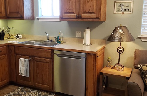 Dripping Springs Cottage | The Cowhouse, a cozy hilltop guesthouse at Barkspin Oaks Ranch. Beautiful views!