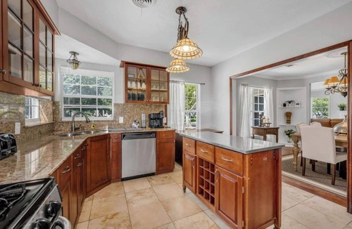 Oak Cliff House | The private home features two master suites with King beds and full attached bathrooms. The loft is 3rd private getaway with a Queen bed and attached full bath. Fully stocked kitchen and a separate Oak dining area.