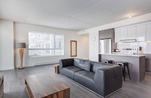 Laval Apartment | Upscale 3BR Apt: BBQ Area & Lovely Skyline Views