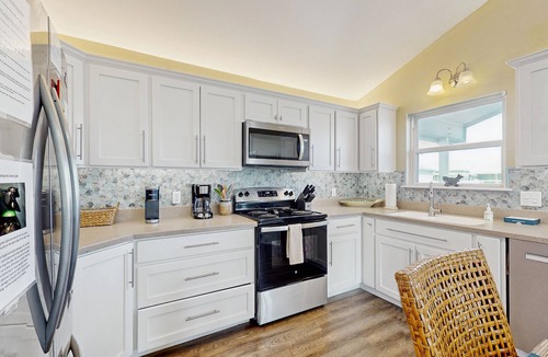 City-by-the Sea House | Welcome to The Lazy Bay | Canal Front Home with Boat Dock